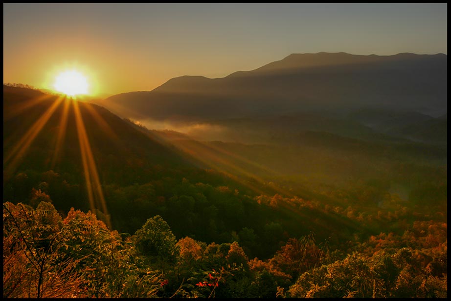 The Sun rises over the mountains and fog of Great Smoky Mountains National Park, Tennessee and Bible verse Job 38:12 God commands the morning