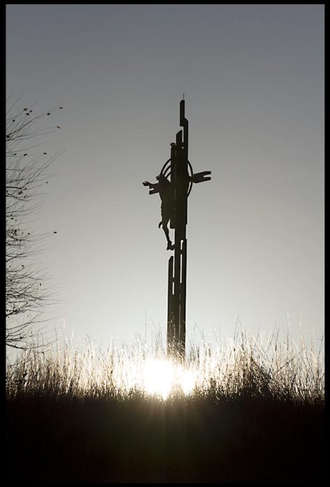 A silhouetted Christ on the cross for Good Friday, the Holy Family Shrine, Eastern Nebraska.  Christ's Sabbath Rest