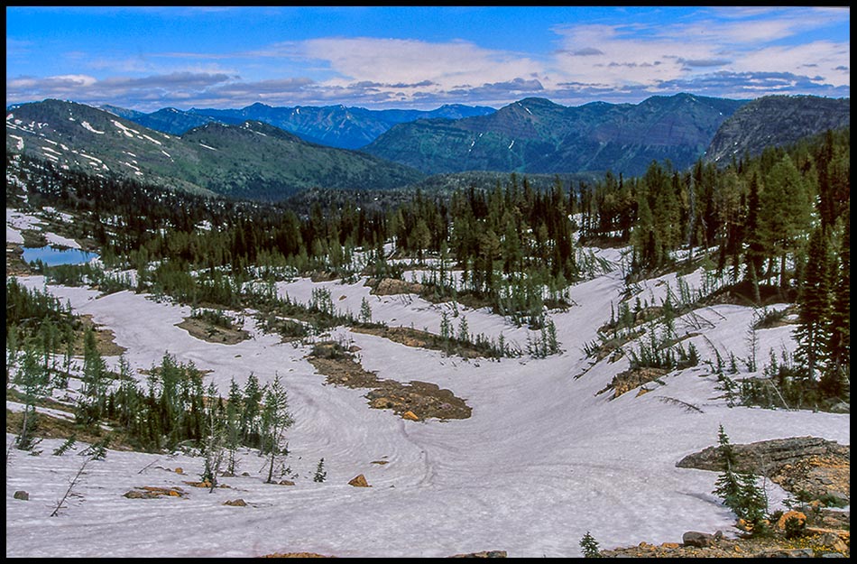 Melting snow in necklace pass, Bob Marshall Wilderness, Montana and Luke 4:18-19, 21. The spirit of the Lord.“