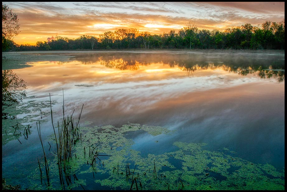 Daybreak sky over the waters of The Great Marsh, Fontenelle Forest, Bellevue, Nebraska. Bible Verse of the Day: Matthew 25:23 