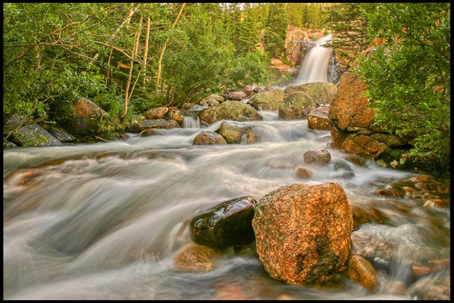 The peaceful flow of a mountain stream below Alberta Falls, Rocky Mountain National Park, Colorado and John 4, Jesus and eternal life in living water