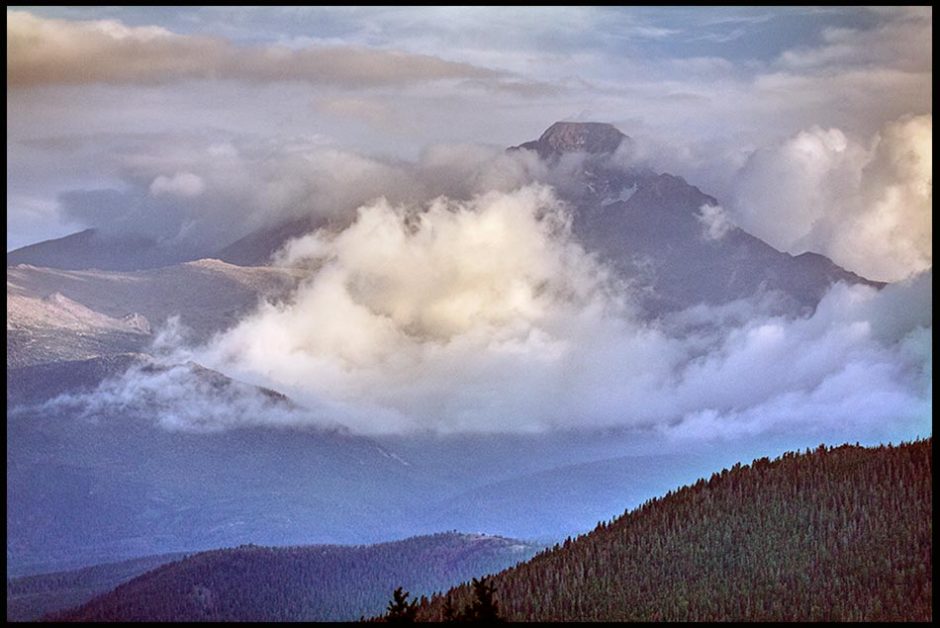 Clouds block much of Longs Peak in Rocky Mountain National Park. Bible verse of the Day Exodus 24:15-16 cloud covered