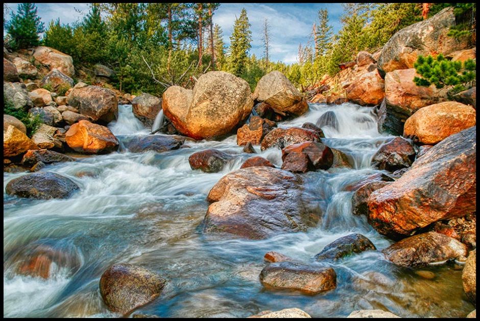 A Fall River tributary flows of rocks in cascade, Rocky Mountain National Park, Colorado Bible Verse of the Day: Luke 2:10, “Joy to the World” and