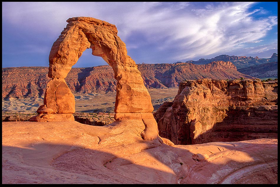 Delicate Arch shortly before sunset, Arches National Park, Utah and Ephesians 6:10-11. Bible verse to Stand firm 