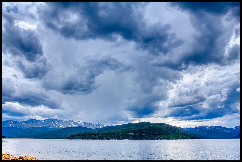 Storm clouds of God over Turquoise Lake in the Mountains of San Isabel National Forest near leadville, Colorado. ible Verse of the Day: Psalm 18:10-11
