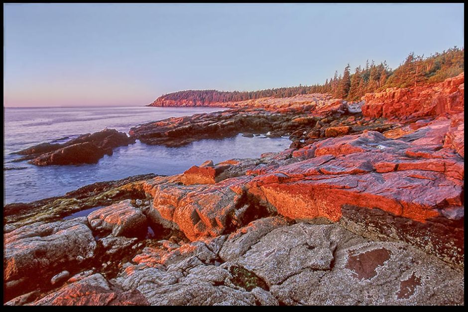 Otter Cliffs on the coast of the Atlantic Ocean in Acadia National Park, Maine and Genesis 1 Bible verse God created the seas