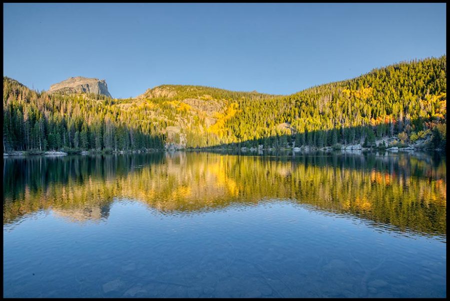 Blue sky, Hallet Peak and Flattop Mountain reflect in Bear Lake, Rocky Mountain National Park, Colorado. Bible Verse of the Day: Psalm 62:5, silence