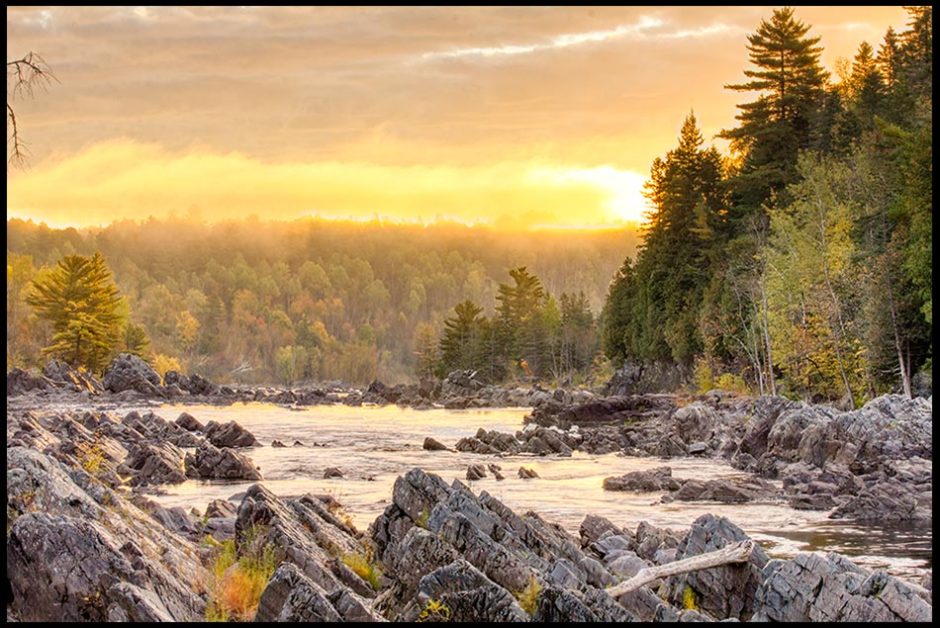 A golden sunrise and fog over the Forest and Water of Jay Cooke State Park, Minnesota and Bible verse Isaiah 60:1-2, God's light and glory