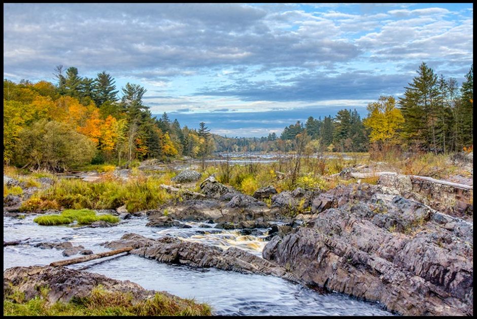 Fall colors along the rock of the Saint Louis River, Jay Cooke State Park, Minnesota and Isaiah 40:13-14 Bible verse on God being omniscient