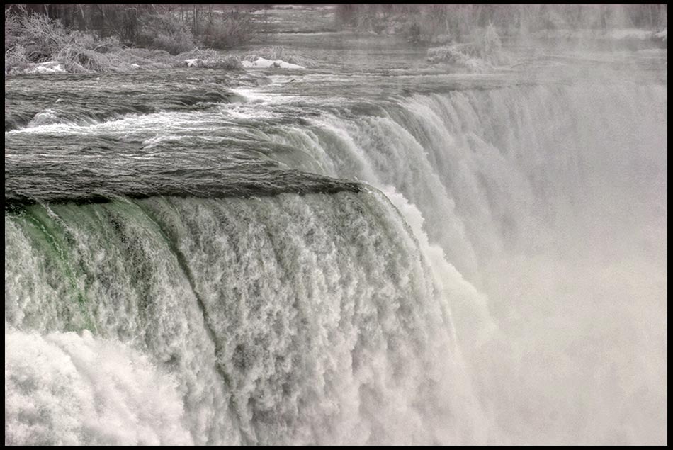Water flows of the edge of Niagara Falls, Niagara Falls State Park, New York. Psalm 104:7 God's thundering power
