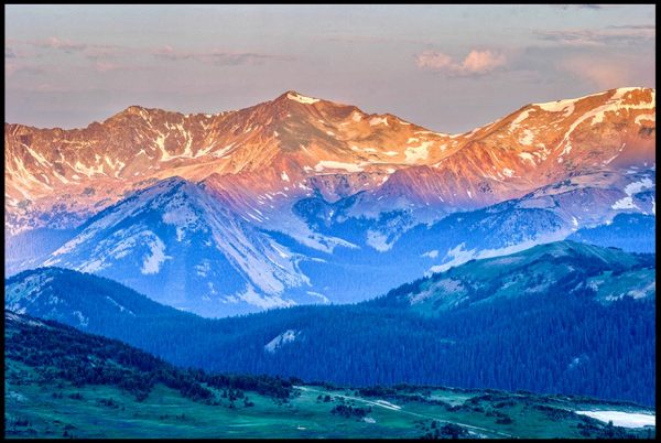 The Never Summer Mountain Range at sunrise in Rocky Mountain National Park, Colorado and Isaiah 52:7 bible verse our god reigns