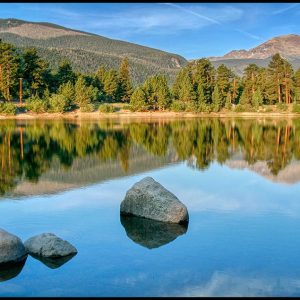 Mountains reflect in a small still lake in Rocky Mountain national park with Bible verse 2 Thessalonians 3:16 Lord of peace