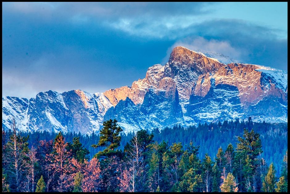 Snow covered mountains and Stormy Skies, Rocky Mountain National Park, Colorado and Psalm 148 Bible verse "Let them praise the name of the LORD.”