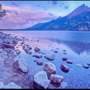 Purple storm clouds above Jenny Lake and Mount Teewinot at sunrise, Grand Teton National Park, Wyoming and Colossians 1:16 Bible verse God created heaven and earth